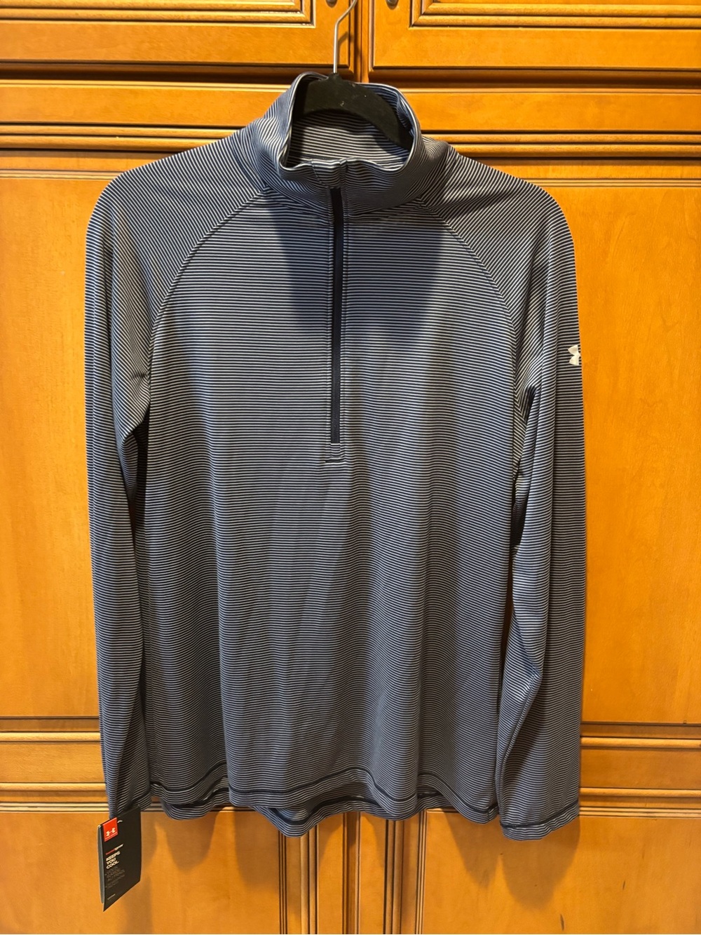Under Armour Ladies Navy and Grey Quarter-Zip Performance Top. Size: M